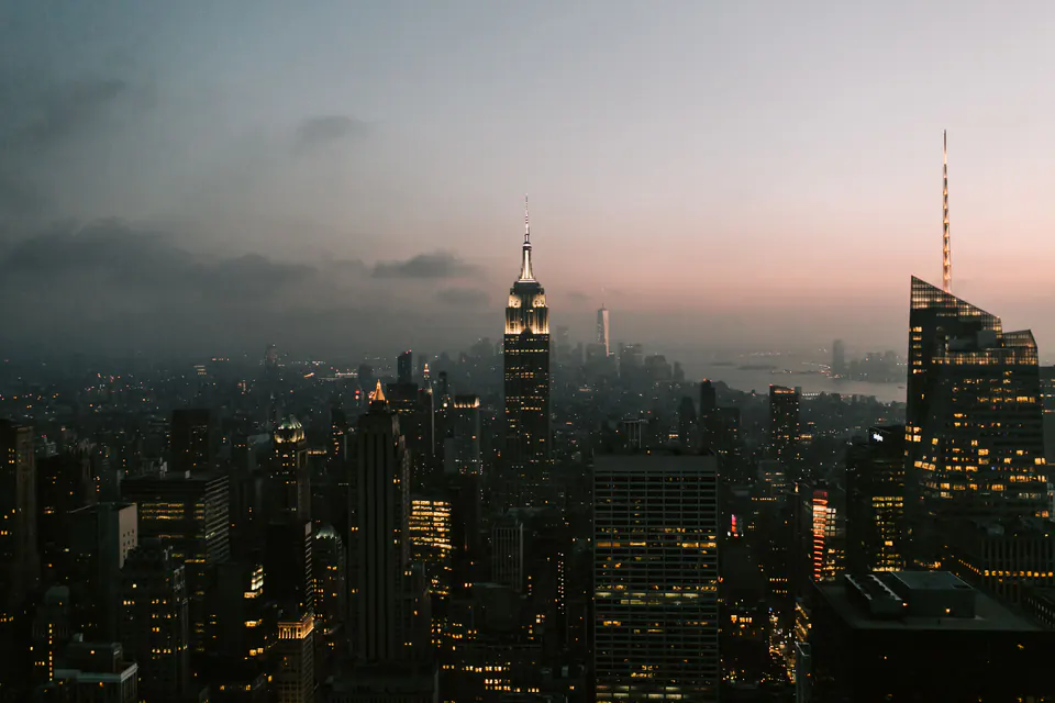 The Manhattan skyline at dusk with the Empire State Building.